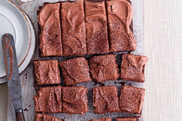 Chocolate sheet cake cut into squares