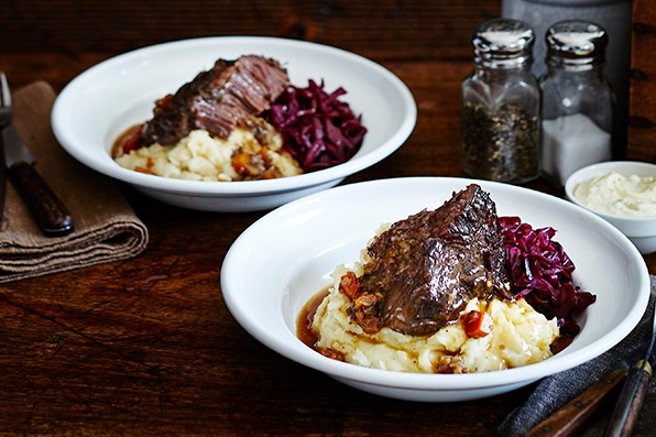 Spitfire-braised ox cheek with mash, red cabbage and English mustard clotted cream