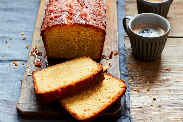 A golden loaf cake drizzled with a grapefruit icing