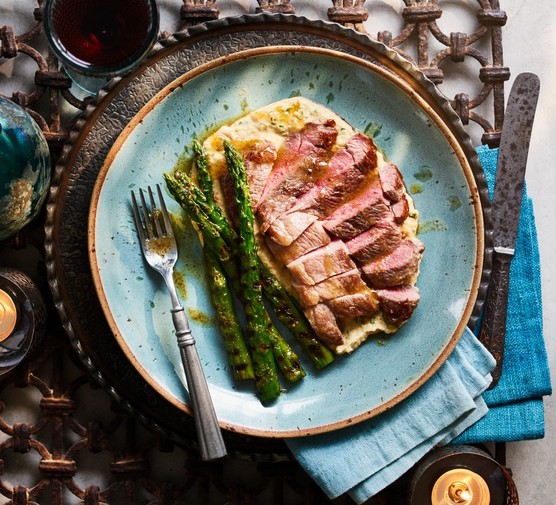 Lamb steaks with yeast butter and warm hummus