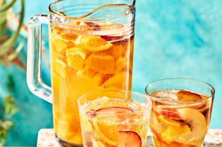 White sangria in jug and glasses